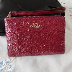 NWOT Coach Signature Debossed Leather Corner Zip Wristlet in BURGUNDY RED
